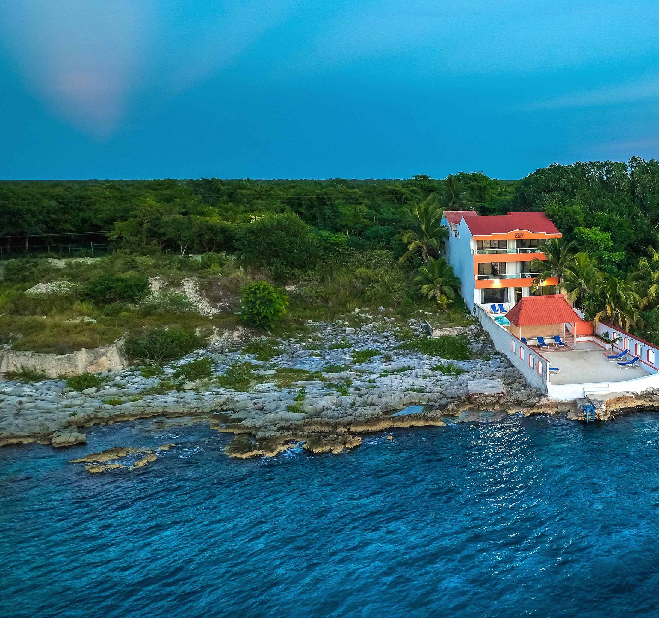 First light over a private Island Casa home on the Cozumel shore